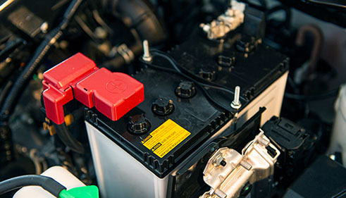 Why do valve controlled batteries emphasize strict float charging voltage?